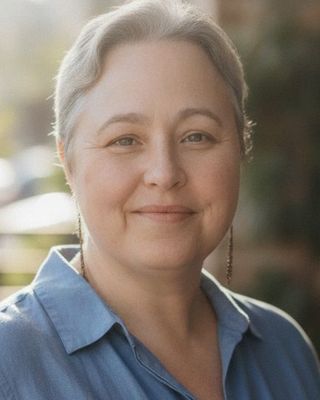 Photo of Meredith McQuagge, Licensed Mental Health Counselor, MA, LMHC, ADHD-CC, ASDCS, C-DBT
