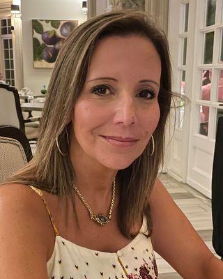 Photo of Isabel A Bustamante - Isabel A. Bustamante : Rising Calm Center, MEd, MSABA, CLHC
