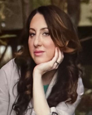 Photo of Mia Raymond, Marriage & Family Therapist, MA, LMFT, CEDS, -C