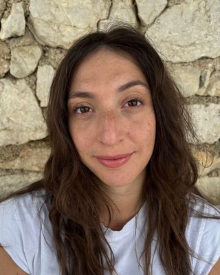 Photo of Hannah Theodorou, Psychotherapist, MA, HCPC-Art Therap.
