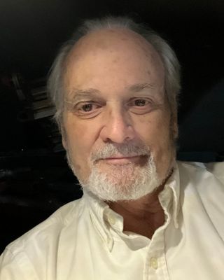Photo of Dr. Tom B Clark, PhD, MSc, MA, MBA, BSc