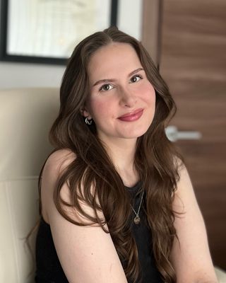 Photo of Maddie Becker, Licensed Professional Counselor, MS, MA, NATC