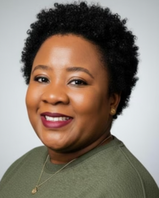 Photo of Olayinka Okin, Marriage & Family Therapist, LMFT