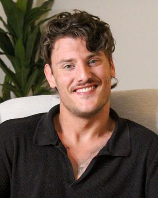 Photo of Caige McAuliffe, Counselor, LMHC, AAT-C, EMDR, TF-CBT