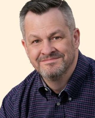 Photo of Dr. Brandon Baker, Psychiatrist, DO