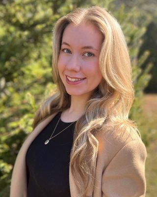 Photo of Ashleigh Bell, Registered Psychotherapist (Qualifying), RP