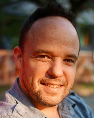 Photo of Adrian McKerracher, Registered Psychotherapist, PhD