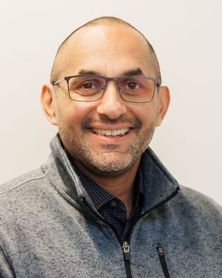Photo of Julio Villacis, Licensed Clinical Mental Health Counselor, LCMHC