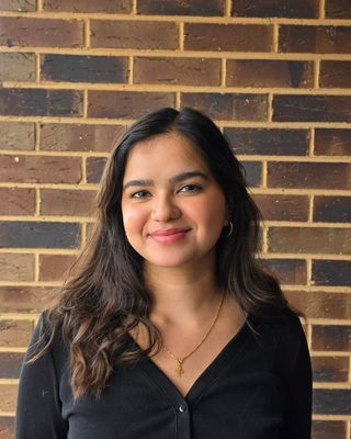 Photo of Merin Abraham, Counsellor, MC, ACA-L2