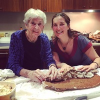 Gallery Photo of My Granny ten years into Alzheimer's disease making our favorite chocolate roll ice cream cake.