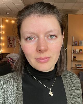 Photo of Alisa Popova, Counselor, MA, LMHCA, LMT, RYT