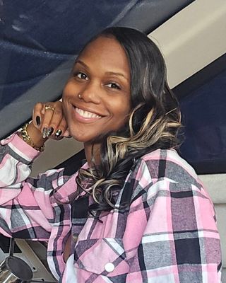 Photo of Yashira Brooks, Licensed Clinical Professional Counselor, LCPC , CSTIP, DBT, TF-CBT, RYT