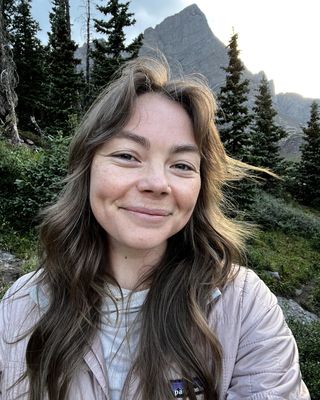 Photo of Dr. Allie Hauck, Licensed Professional Counselor, PhD, LPC, RYT-200