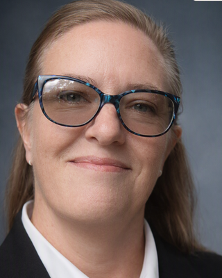 Photo of Riki Camacho, Licensed Mental Health Counselor, LMHC