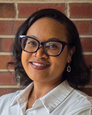 Photo of Nikita Robinson, Pre-Licensed Professional