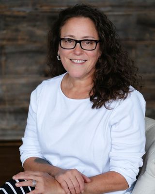 Photo of Becca Neumann, Licensed Clinical Professional Counselor, LCPC, ATR, CCS