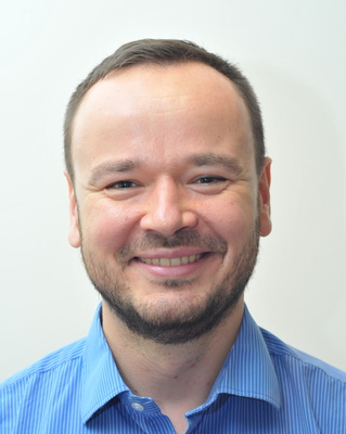 Photo of Dr. Bogdan Wawrzaszek, PhD, MIACP, Psychotherapist