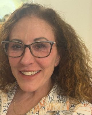 Photo of Tiffani Donelli, Counselor, LMHC-D