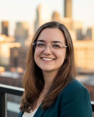 Photo of Laura Bauder, Licensed Professional Counselor, LPC, CAADC, ATR-BC, CCTP, EMDR-PT