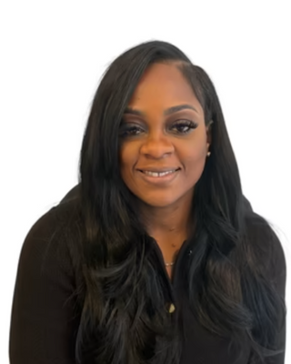 Photo of Medjinn Thomas, Psychiatric Nurse Practitioner, PMHNP