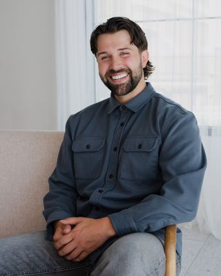Photo of Caleb Featherstone, Marriage & Family Therapist Associate, LAMFT