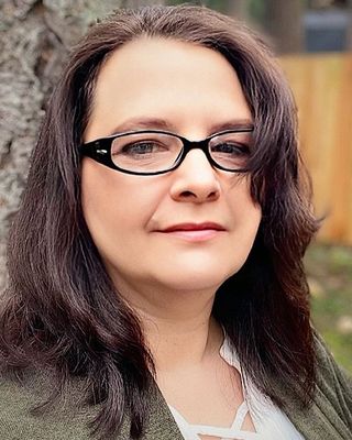 Photo of Emily Pieper, Licensed Mental Health Counselor, LMHC, LPC, LPCC