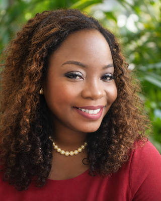 Photo of Funmike Olomofe, LCSW Associate