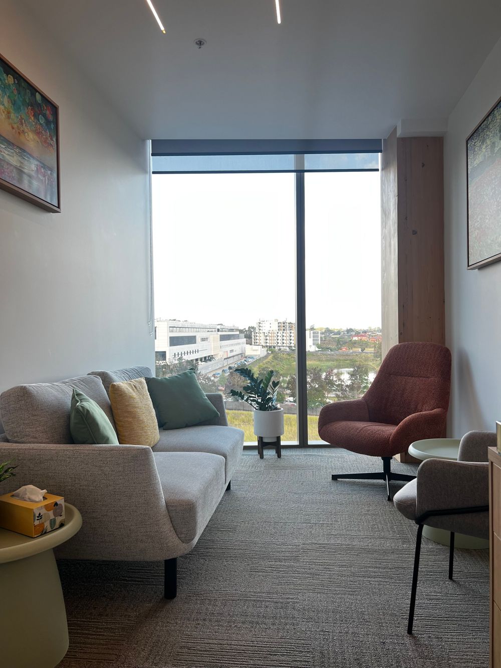 A open and cosy room with a view to help you feel welcome and comfortable in sessions. 