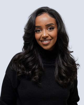 Photo of Muna Adam, Registered Psychotherapist (Qualifying), MPsyc, RP