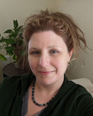 Photo of Lily Mandy Ruest, Counselor, MA, MBA, LCMHC