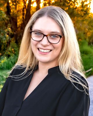Photo of Erin Thiemann, Counselor, LMHC, PMH-C