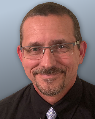 Photo of Esteban Minsk, Licensed Clinical Mental Health Counselor, LCMHC