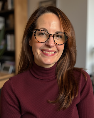 Photo of Dr. Elaine Boland, Psychologist, PhD, DBSM