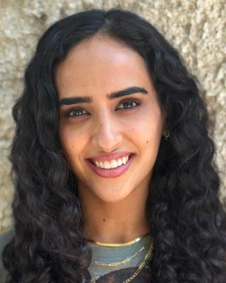 Photo of Dina Elhifnawi, Psychotherapist, DCounsPsych