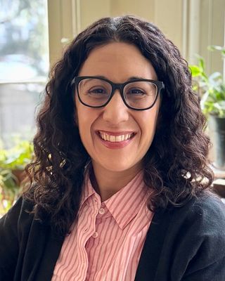 Photo of Yasmine Akky, Pre-Licensed Professional