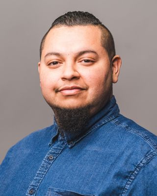 Photo of Emu Aragon, Licensed Clinical Mental Health Counselor, MS, LCMHCQS, LPCMHSP, NCC, ACS