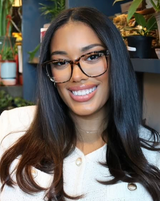 Photo of Dominique Henderson, Pre-Licensed Professional, RMHCI