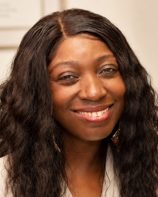 Photo of Ghislaine Mogo, Psychiatric Nurse Practitioner