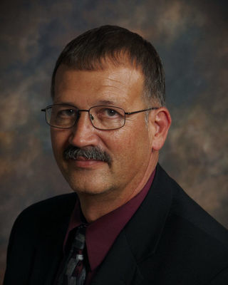 Photo of Bryce D Riessland, LIMHP, LADC, CSAT, Counselor in Kearney