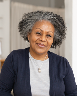 Photo of Thaodra Workneh, Registered Psychotherapist, MD, MEd, CCC
