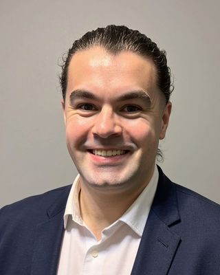 Photo of Oliver Santos, Psychiatric Nurse Practitioner, MSN, APRN, PMHNP