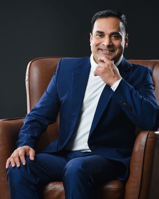 Photo of Dr. Mathew Thomas, Registered Psychotherapist, PhD