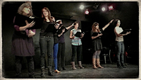 Gallery Photo of The workshop women perform their prose and narratives at the Kraine Theater in NYC