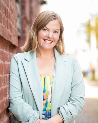 Photo of Sara Renauer-Reid, Counselor, LCPC, RDT, MA