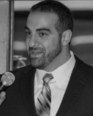 Photo of Alex Rezcallah, MEd, LCMHC, TSAC-F, Counselor in Elon