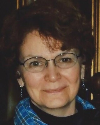 Carla M Van Hoose