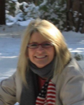 Photo of Dr. Aly Carlile, MA, PsyD