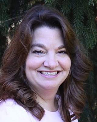 Photo of Erika A Caulfield, LMHC, Counselor