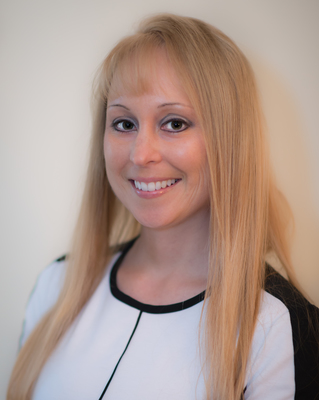 Photo of Dr. Kristy Camille-McKiness, Counselor in Oswego, IL