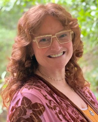 Photo of Holly Floyd, Marriage & Family Therapist, LMFT, CCTP, CGIP, TCTSY-F, RYT500